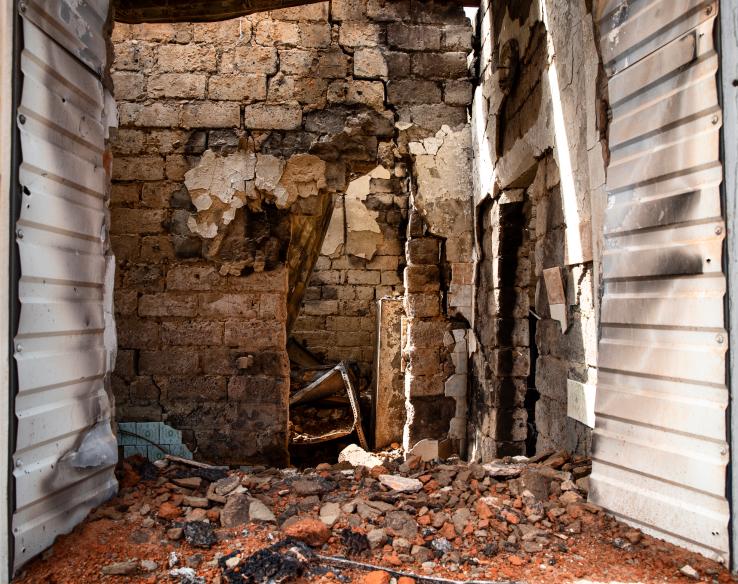 a collapsed brick wall